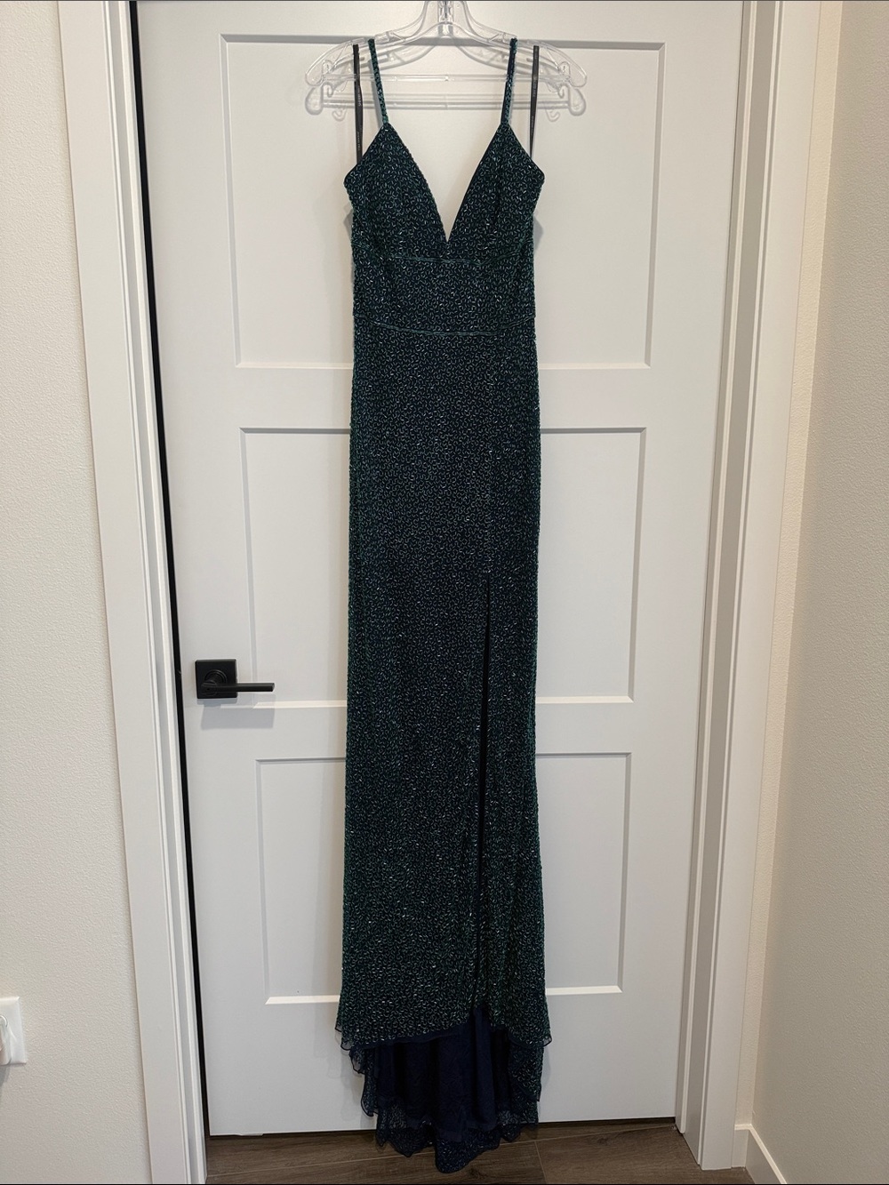 Stunning Sherri Hill formal dress with green beading throughout. Beautiful train